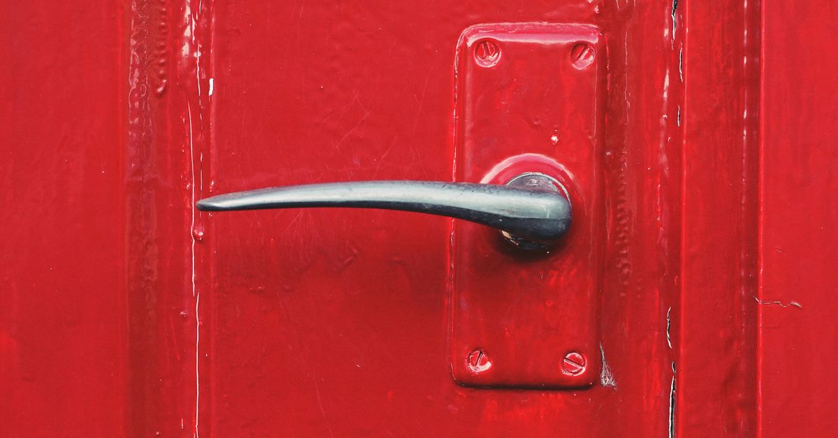 locksmith unlocking front door — Johnson County Locksmiths